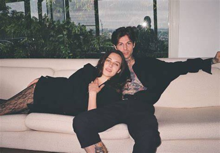Devon Lee Carlson and Jesse Rutherford posing for a photo