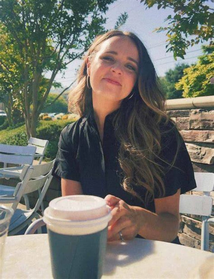 Jinger Duggar posing with coffee