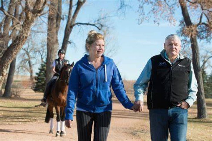 John Malone With Wife Leslie Malone